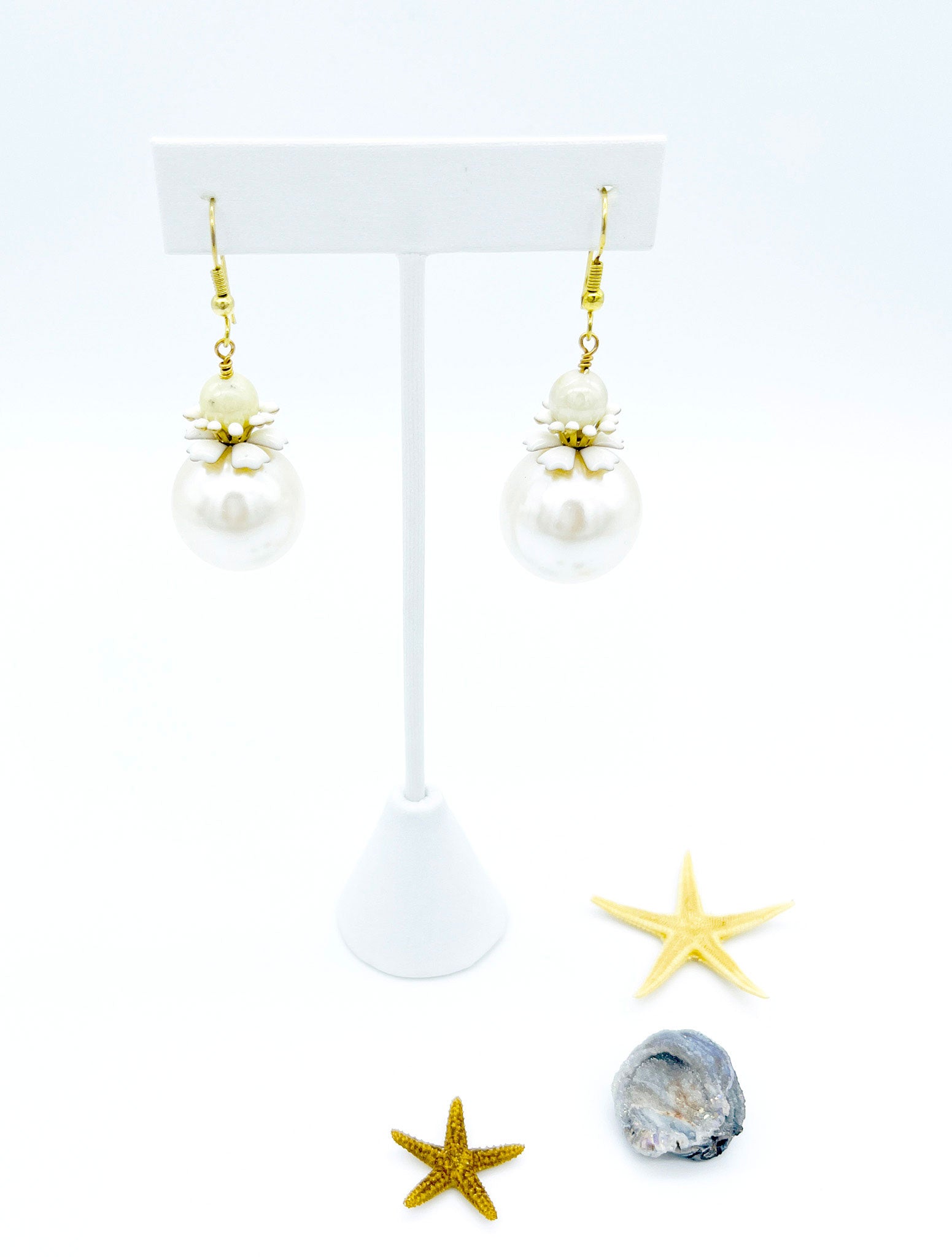 Flower and pearl drop earrings