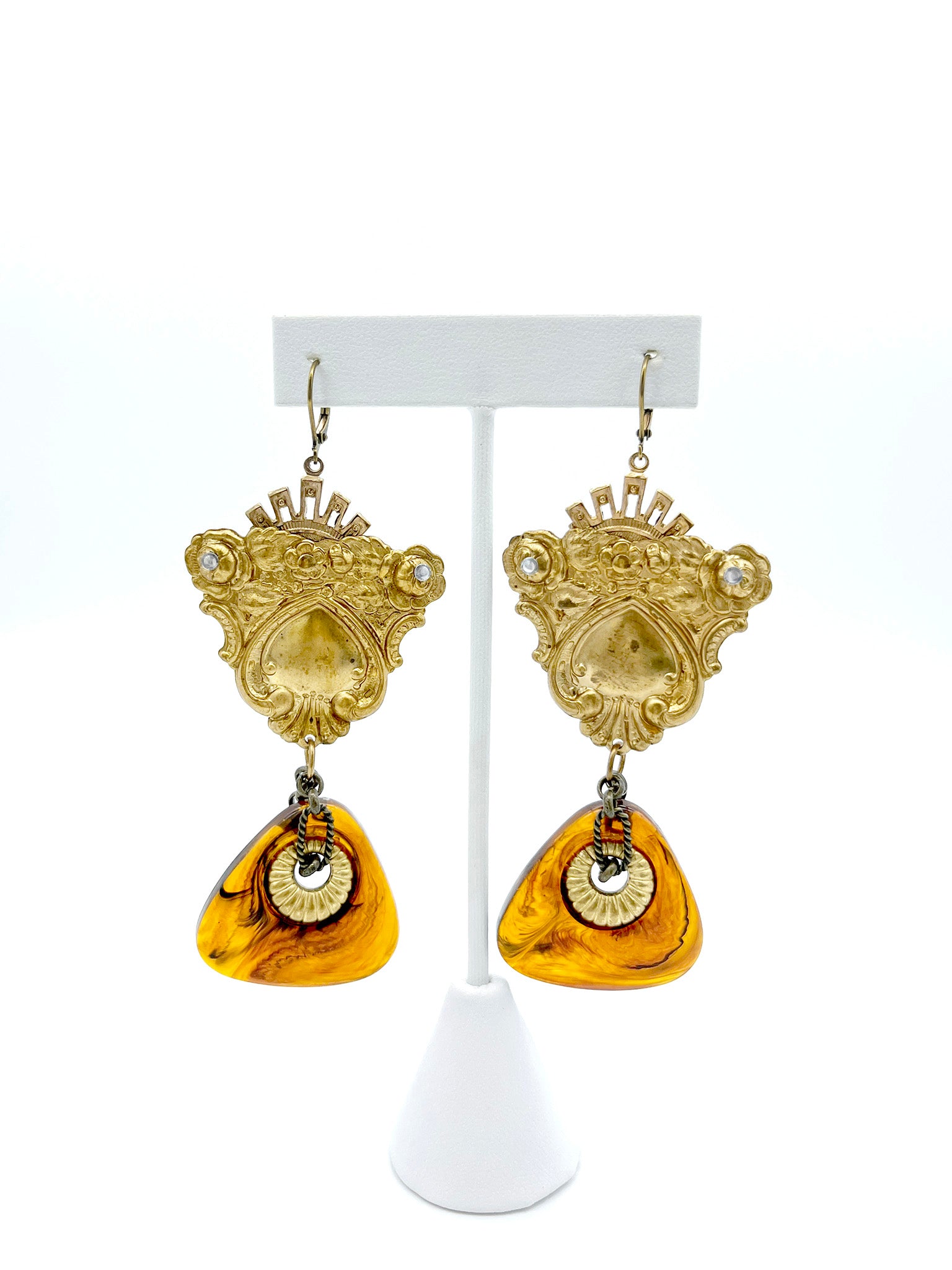 Close look of brass and bakelite earrings