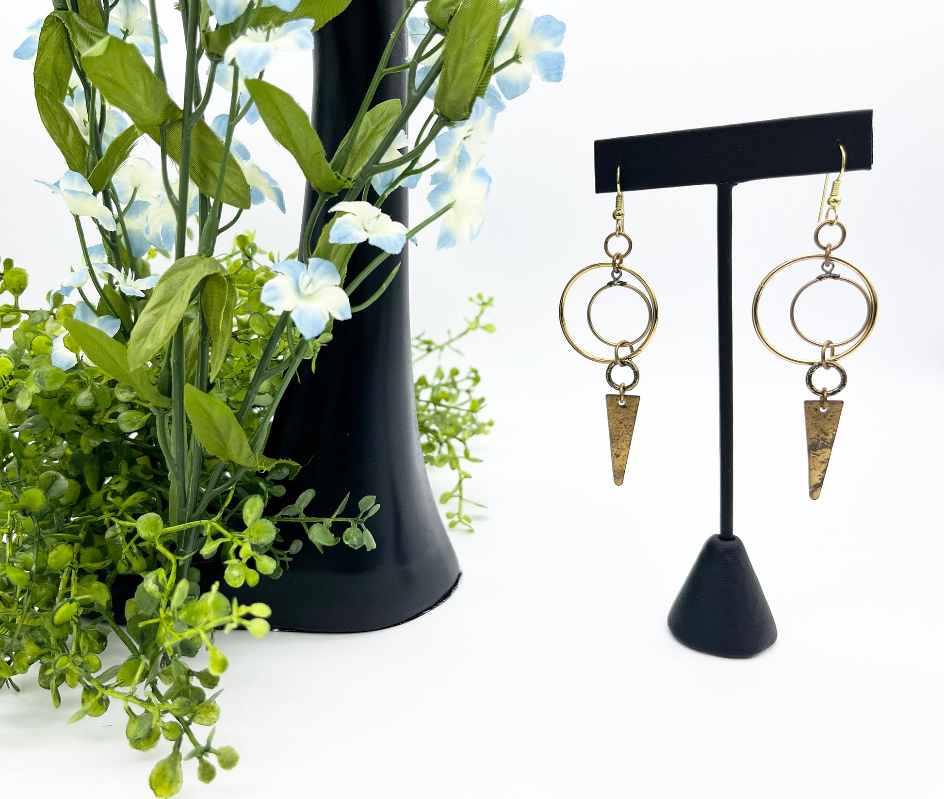 Symmetrical ring dangle earrings