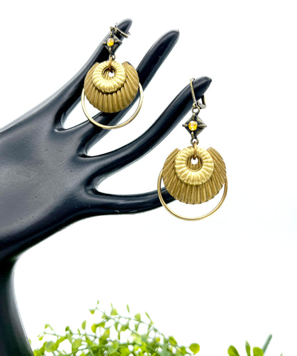 Up close look of textured brass earrings