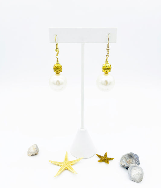 Golden pearl drop earrings