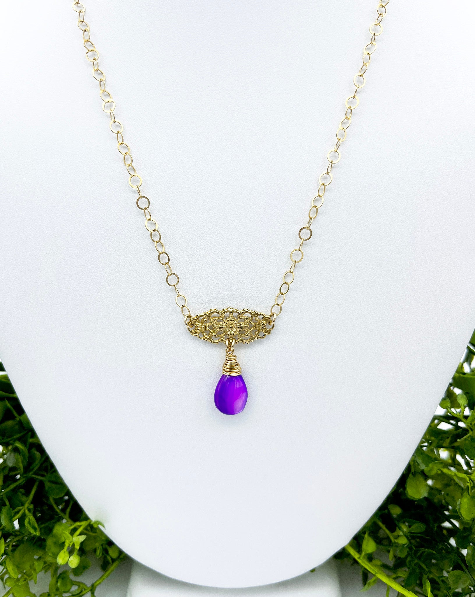 Gold and purple pearl necklace