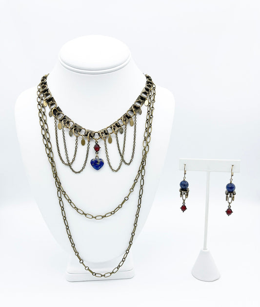 Multistrand brass necklace and lapis lazuli earrings