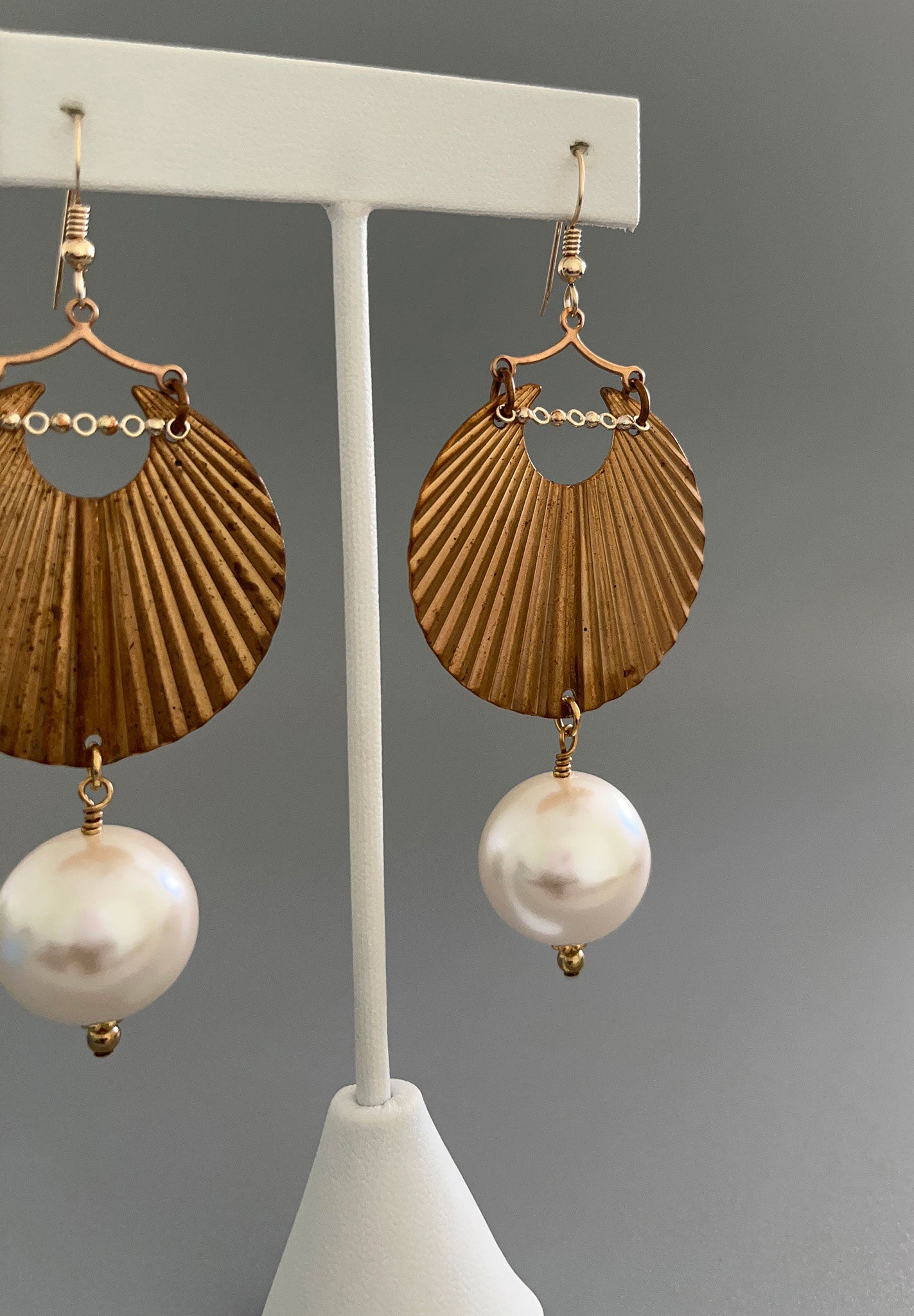 Pearl and textured brass earrings