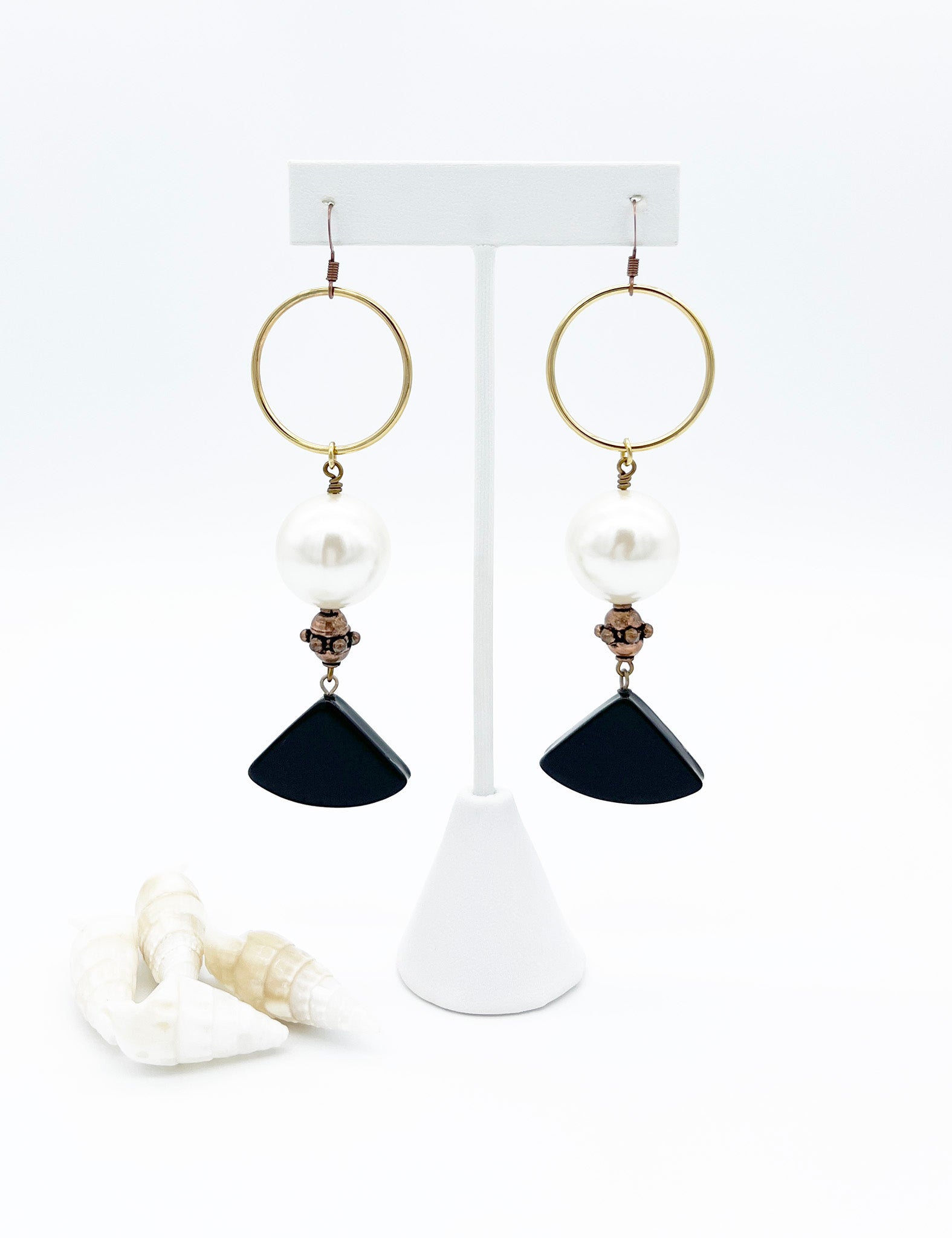Symmetrical pearl and acrylic earrings
